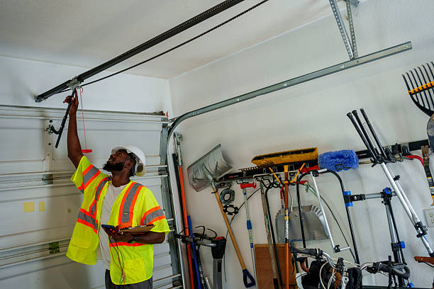 Professional Garage Door Panel Replacement technician working in Greilickville, MI